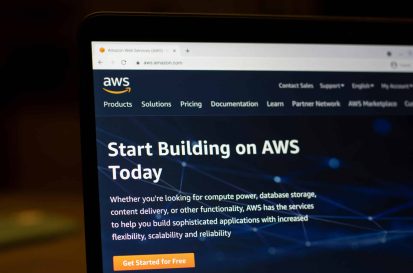 Portland, OR, USA - Mar 7, 2021: The homepage of Amazon Web Services (AWS) is seen on a laptop computer. AWS is a subsidiary of Amazon providing on-demand cloud computing platforms and APIs.